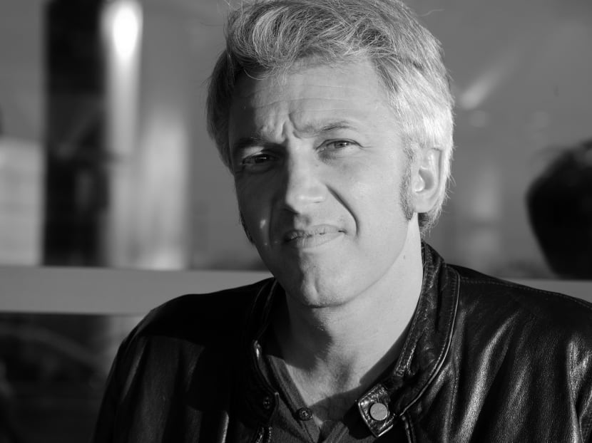 French Photographer presents Singapore landmarks overrun by nature