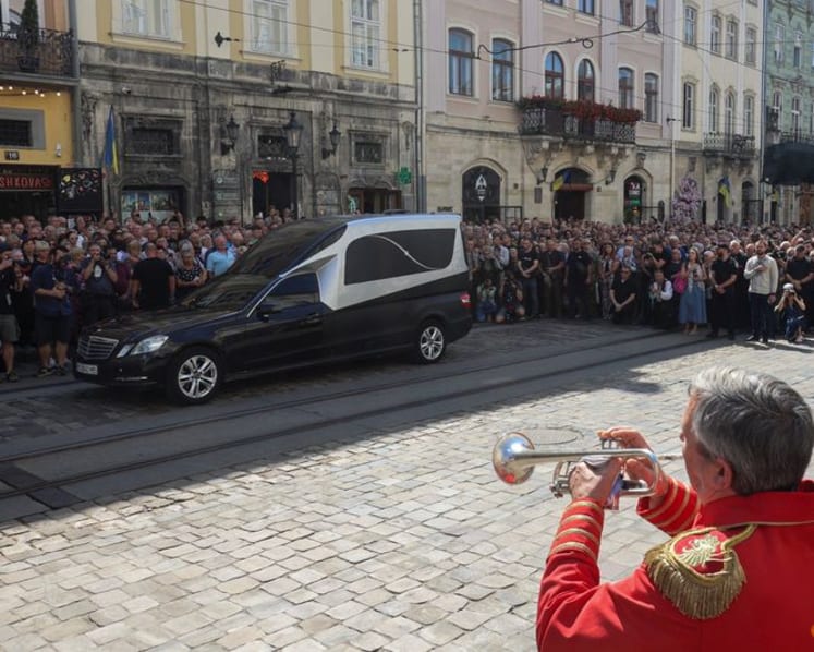 Former Ukraine parliament speaker Parubiy buried after assassination in Lviv