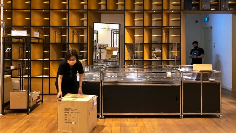 Tears flow, sadness prevails as Robinsons employees eye empty shelves, serve customers before closure