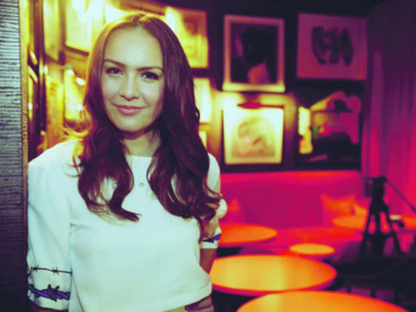 Singaporean singer Ming Bridges is back with her latest Mandopop EP, Beautiful Melody. Photo: Wee Teck Hian/TODAY