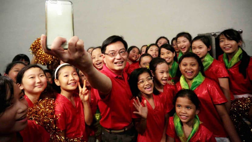 Fellow ministers note Heng’s ‘incredible load’, hail his strong work ethic
