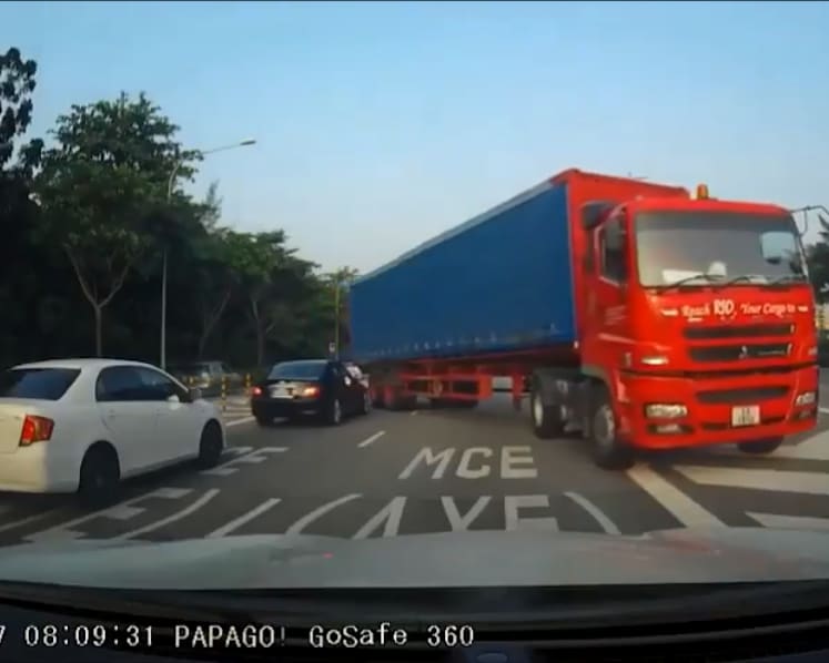 Trailer truck makes illegal u-turn, driving in wrong direction at MCE entrance