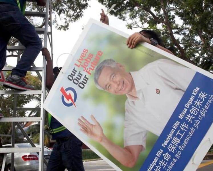 Man fined for defacing PAP election poster in first such prosecution, says he could not reach SDP poster