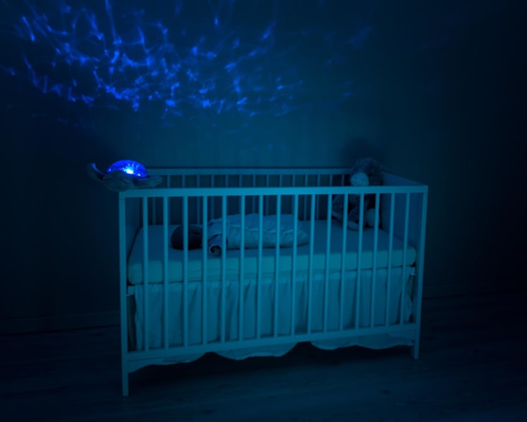 Woman charged with dropping 2-month-old baby into cot, fracturing her skull