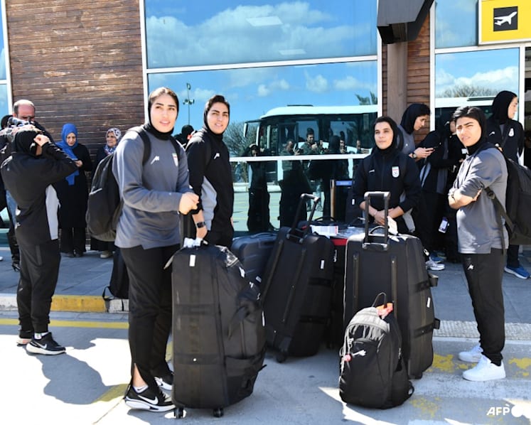 Iranian women's football team arrive back in Iran after some withdrew asylum claim