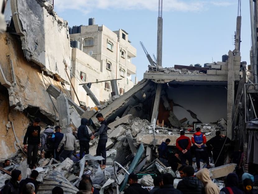 Palestinians gather at the site of an Israeli strike, amid the ongoing conflict between Israel and Hamas, in Rafah, in the southern Gaza Strip on March 4, 2024. Palestinians gather at the site of an Israeli strike, amid the ongoing conflict between Israel and Hamas, in Rafah, in the southern Gaza Strip on March 4, 2024.