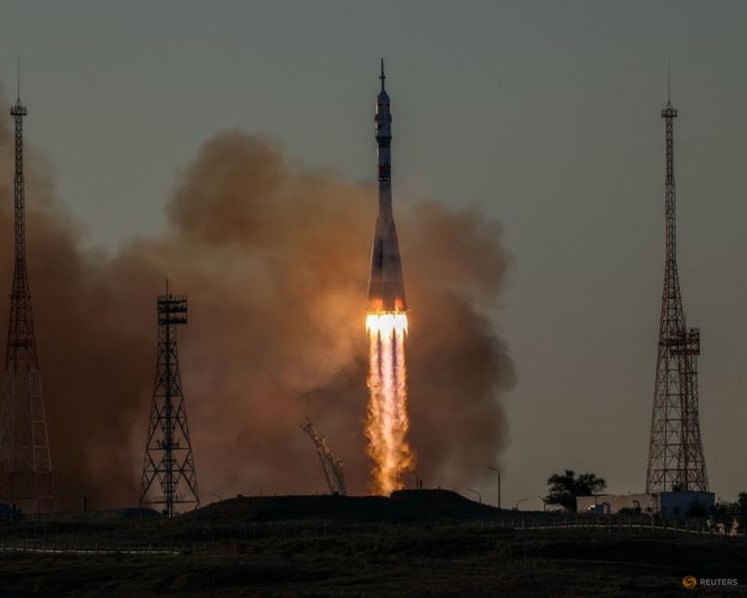 Russia sends American and two cosmonauts to space station with rare NASA chief visit