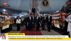 Trump lands in China for high-stakes meeting with Xi