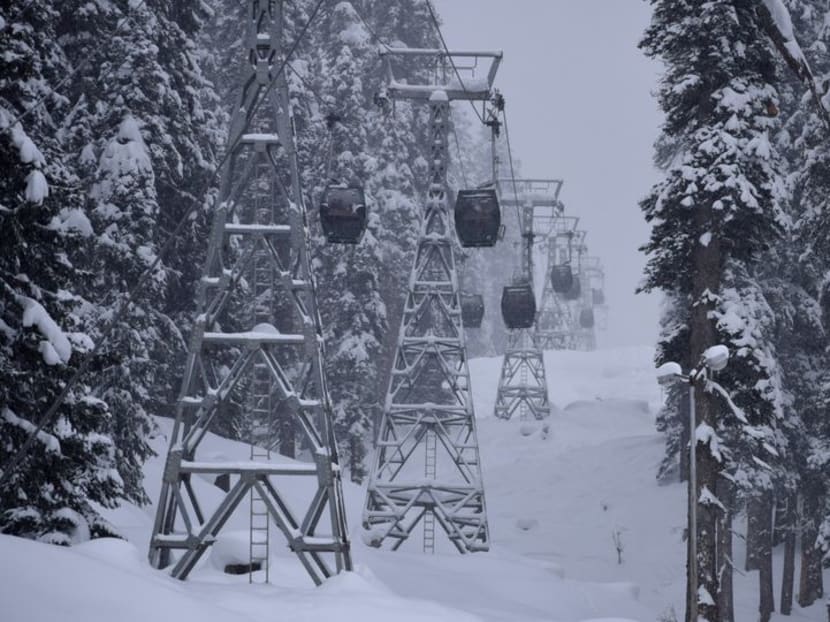 Cable car cabins are pictured in Gulmarg, a ski resort and one of the main tourist attractions in the Kashmir region, on Jan 22, 2022. Cable car cabins are pictured in Gulmarg, a ski resort and one of the main tourist attractions in the Kashmir region, on Jan 22, 2022.