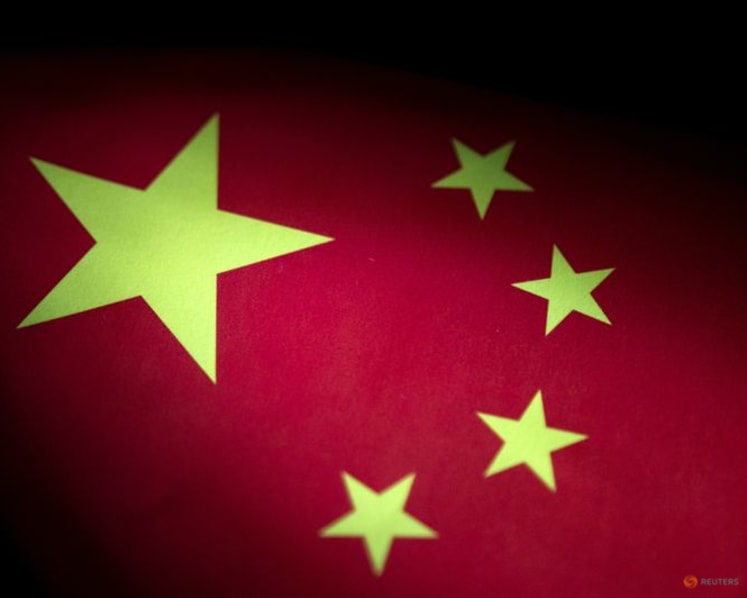 China conducts naval, air patrols around disputed shoal in South China Sea