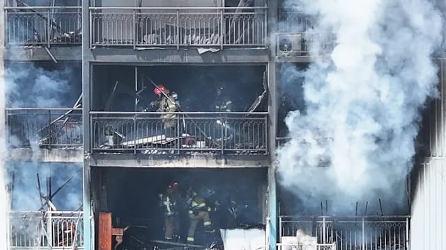 死者字条揭财困 韩国公寓火患不排除纵火