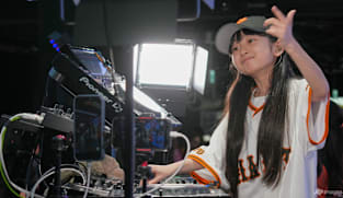 Japan's 9-year-old DJ Rinoka bobs to the beat as a child prodigy techno artist