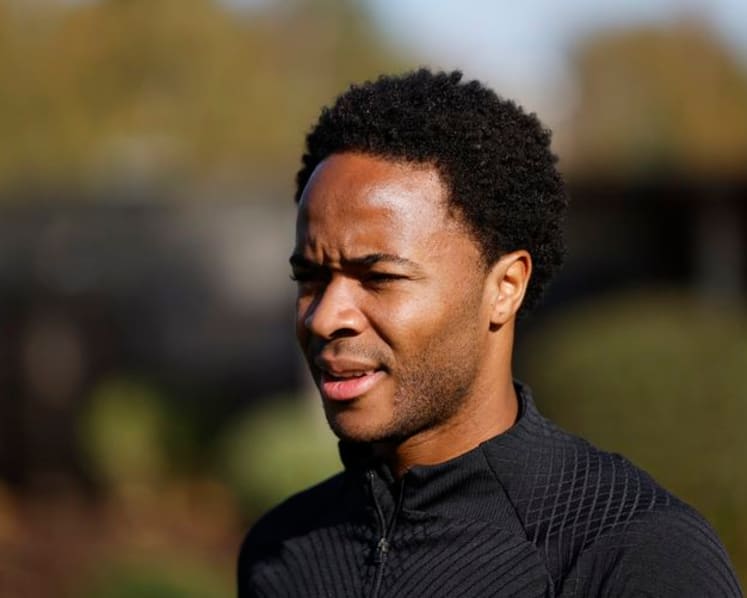 Former England forward Sterling charged with dangerous driving