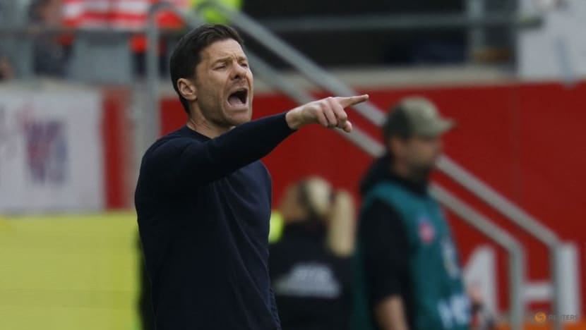 Bayer Leverkusen grab late winner against Heidenheim to keep title hopes alive Bayer Leverkusen grab late winner against Heidenheim to keep title hopes alive