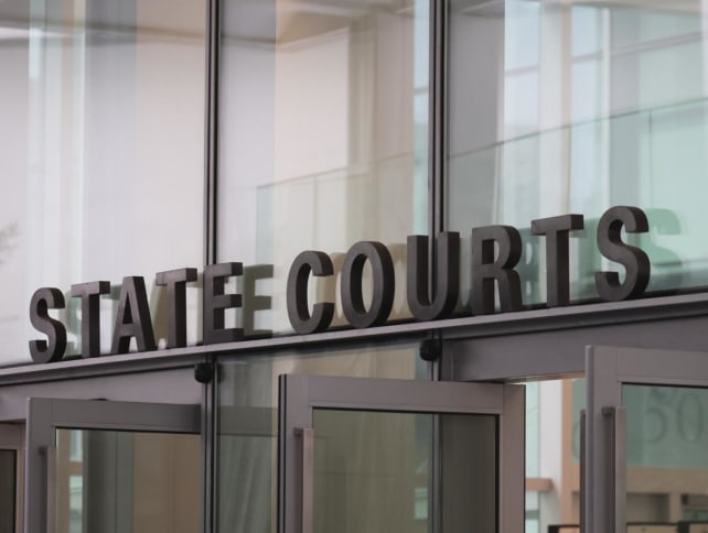 A view of the entrance to the State Courts building.