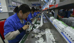 China factory output slows but consumption offers bright spot