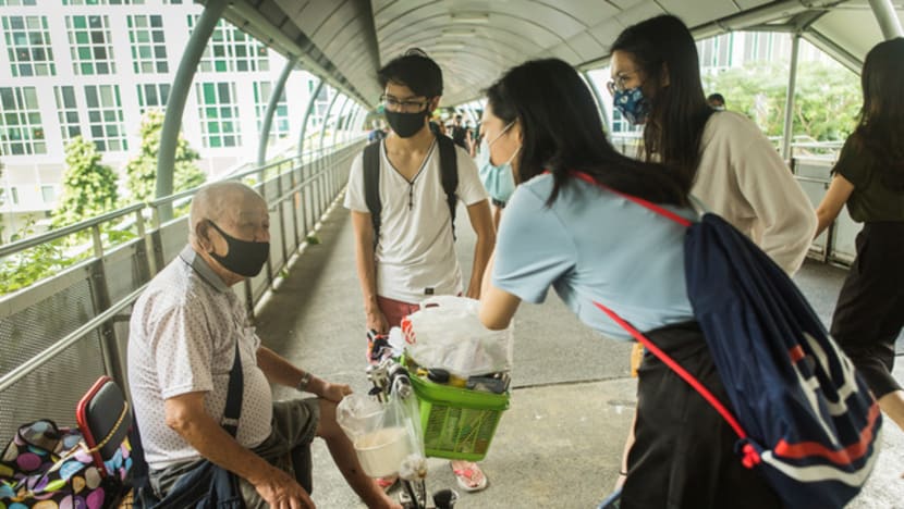 They sell tissue-paper packs out of need. Yale-NUS students now striving to make them a ‘visible community’