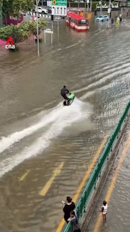 Bangkok man arrested for jet skiing through floodwaters