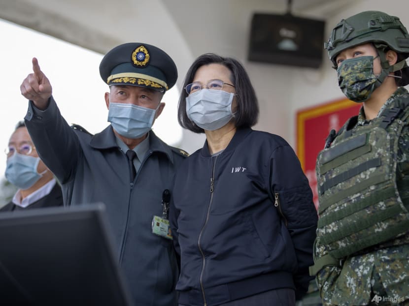 Taiwan's Tsai visits base as China protests US ship passage