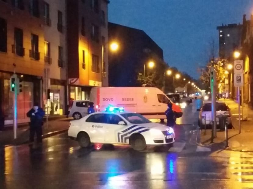 A van of the Belgian bomb disposal unit SEDEE as police block a street during a police raid possibly in connection with the November 13 deadly attacks in Paris, in Brussels' Molenbeek district. Photo: AFP
