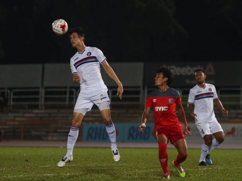 Warriors defender Baihakki Khaizan heading the ball away from a Balestier Khalsa opponent during his team's 2-1 S.League win on Tuesday, Feb 28. Photo: S.League