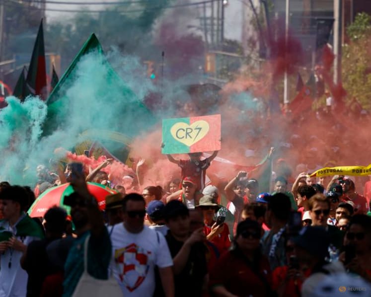 One last dance: Portugal and Croatia fans march in Toronto heat to see Ronaldo and Modric