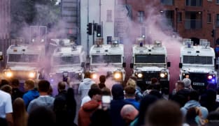 Northern Ireland hit by third night of violence but main flashpoint calmer