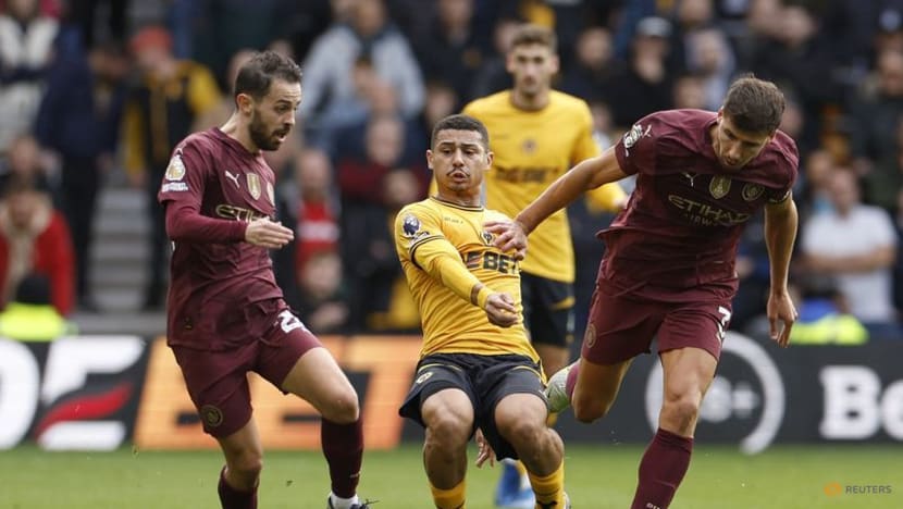 Stones late show earns Man City win at Wolves