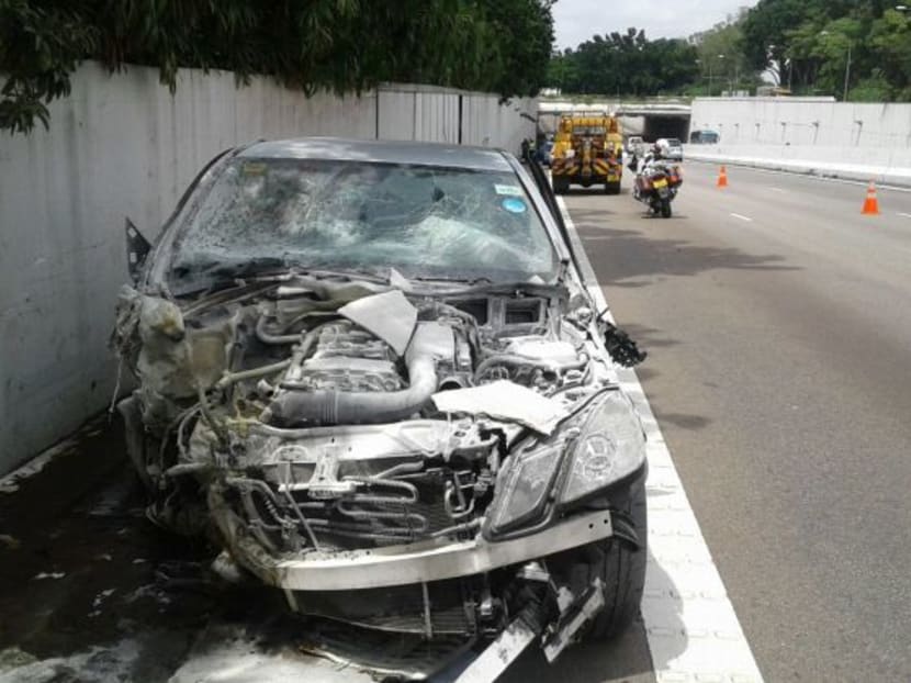 The silver Mercedes involved in the accident along AYE towards Tuas before Tuas West Road at about 8:05am on Monday (Dec 19) morning. Photo: Wee Teck Hian/TODAY