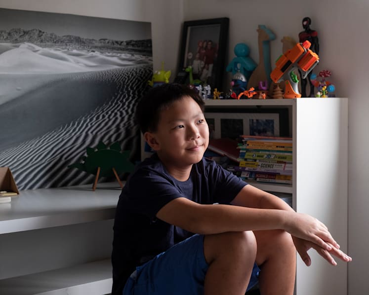 Walking the talk: Oliver Chua, 11, takes shorter showers, buys used toys, and aims to convince peers to do the same