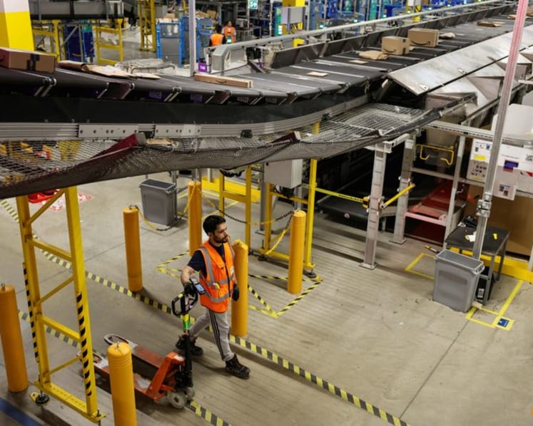 Amazon unveils new AI warehouse robot in $12 billion Europe push