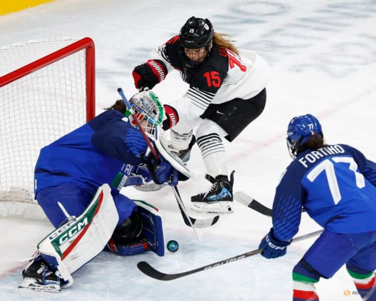 Ice hockey-Italy reach quarters, US and Canada stay unbeaten, Germany beat France in overtime
