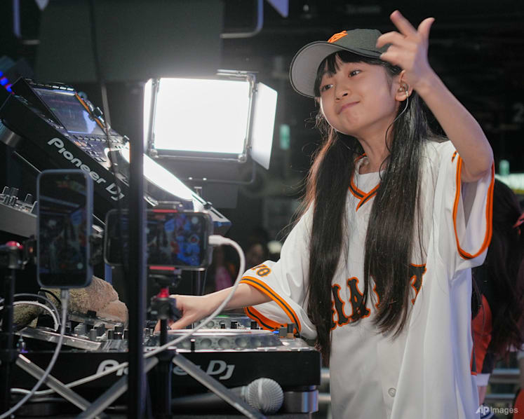 Japan's 9-year-old DJ Rinoka bobs to the beat as a child prodigy techno artist