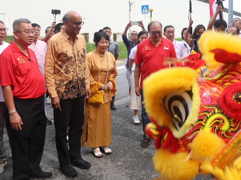 Mr Tharman Shanmugaratnam and his wife, Madam Jane Yumiko Ittogi, at the Sheng Gong Cultural and Folklore Beliefs Festival in Redhill, July 9, 2023.  This is his first public event after stepping down from politics.