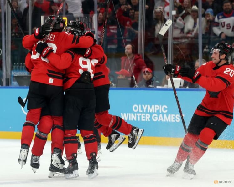 Ice hockey-'Go get it, boys': Injured Crosby's pep talk powers Canada quarter-final comeback