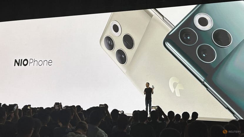 China's Nio launches smartphone developed to use with its electric cars China's Nio launches smartphone developed to use with its electric cars