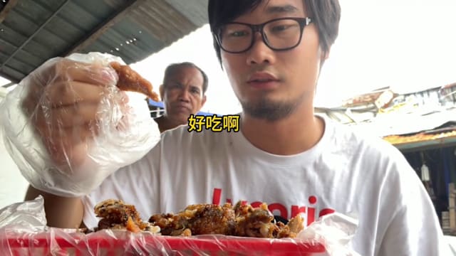 菲律宾贫民区“二手炸鸡” 成打卡景点 网红拍摄引发争议