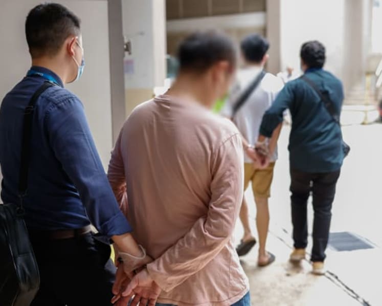 18 arrested for allegedly bringing foreigners into Singapore on illegally acquired work passes
