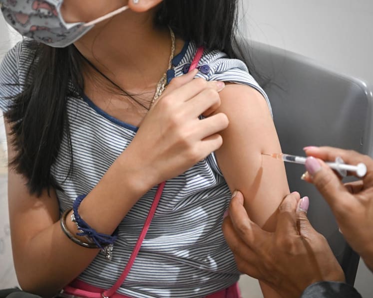 Teachers will accompany children getting COVID-19 shots via school-facilitated exercise, says MOE