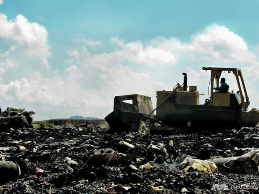 How can Singapore bridge the gap between climate change awareness and sustainable actions?
