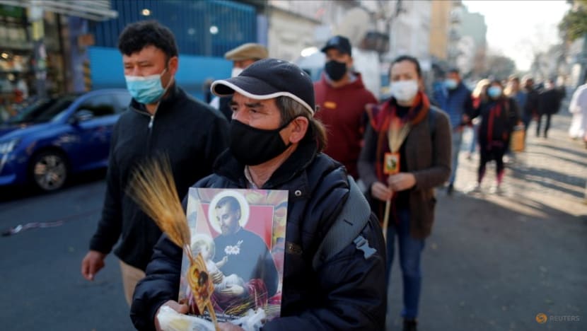 Argentines stream through city streets to press for more jobs, food