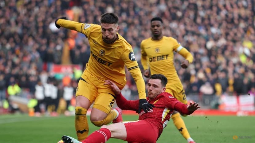 Liverpool edge past Wolves to go seven points clear at top