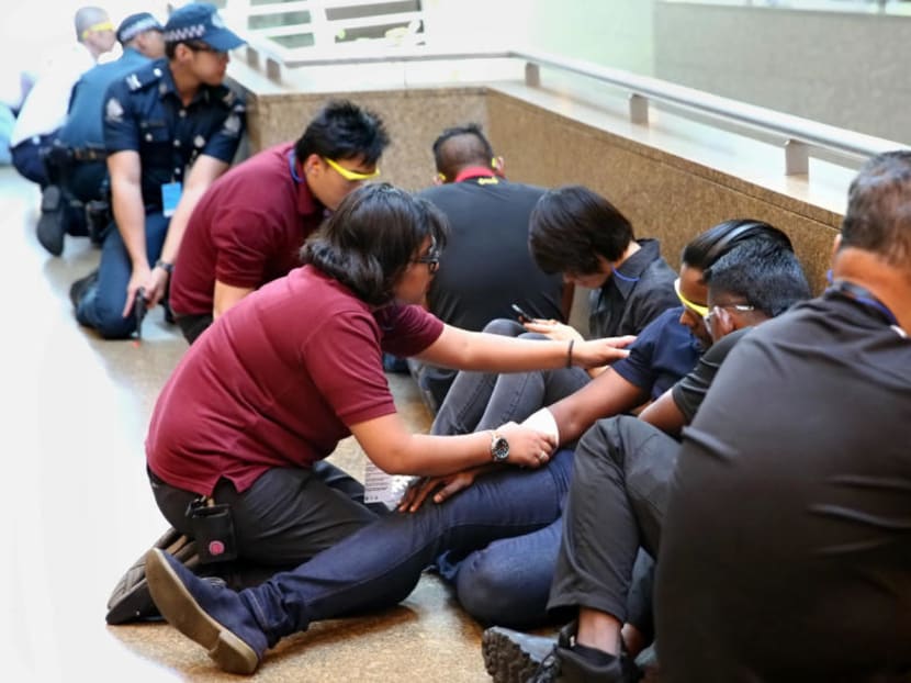 A simulated scenario of an explosion and evacuation during an attack by gunmen at Esplanade-Theatres on the Bay on Sept 2, 2016 conducted by The Singapore Police Force (SPF) and the Singapore Civil Defence Force. Photo: Nuria Ling/TODAY