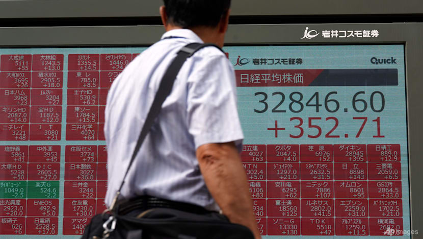 Stocks mixed, precious metals slip in quiet Asian trade