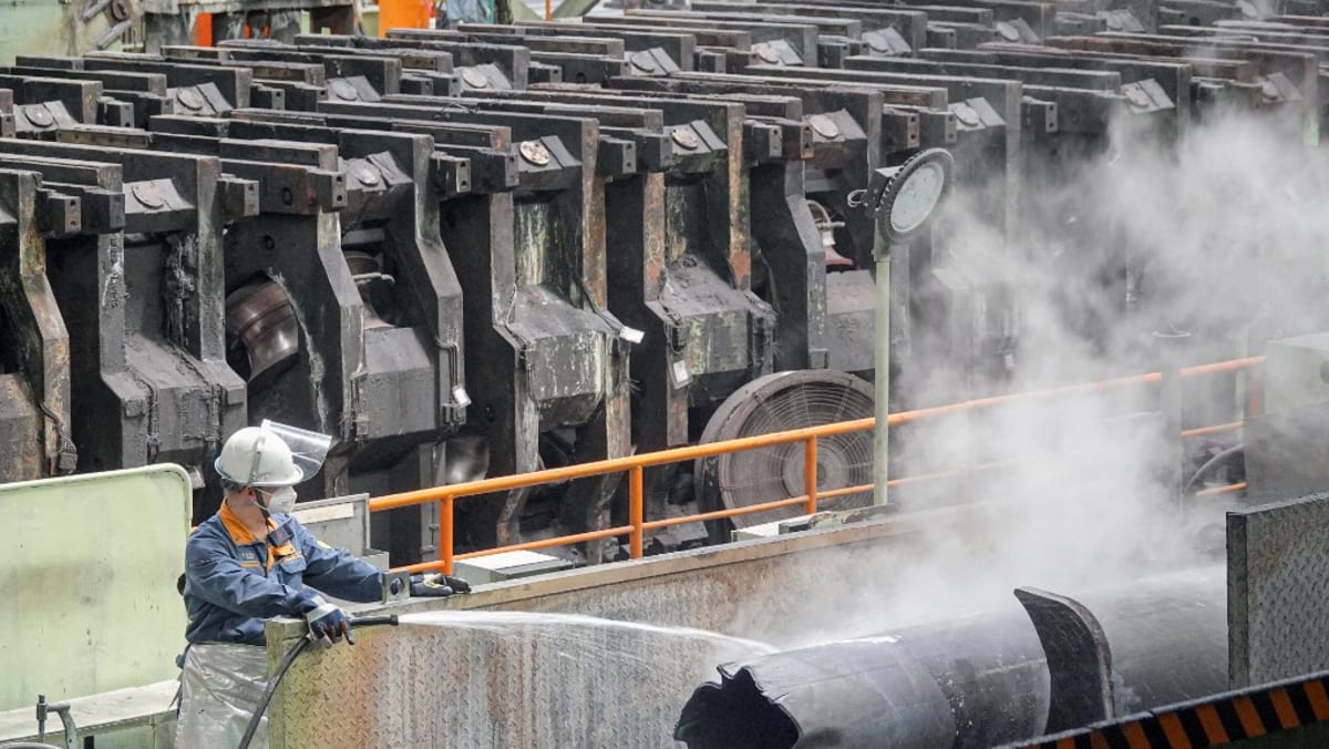 China's manufacturing shrinks in April as trade war bites