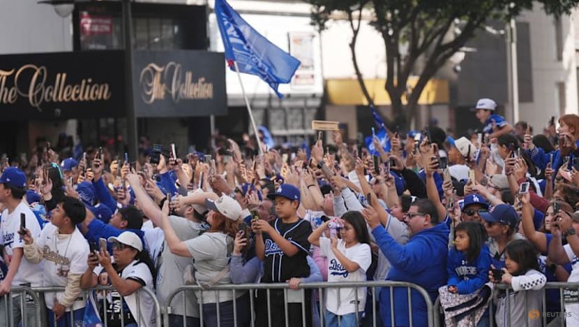 Baseball-Ohtani teases 'three-peat' as Dodgers parade draws Los Angeles crowds