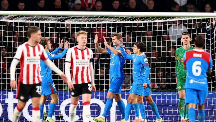 Atletico shoot up Champions League standings with win at PSV