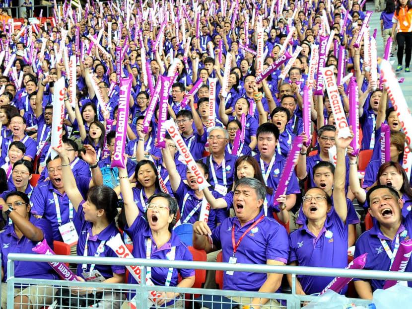 SEA Games volunteers break S'pore record for 'Largest Human Formation of a Numerical'