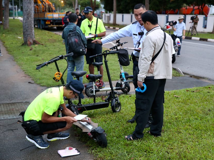 PMD riders who were riding on the road were stopped and had their PMDs impounded by enforcement officers along Loyang Lane on January 15, 2018. PMD riders who were riding on the road were stopped and had their PMDs impounded by enforcement officers along Loyang Lane on January 15, 2018.