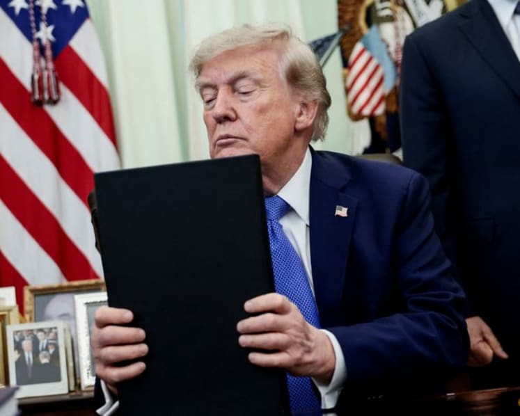 Trump unveils trade actions to protect key solar and semiconductor material